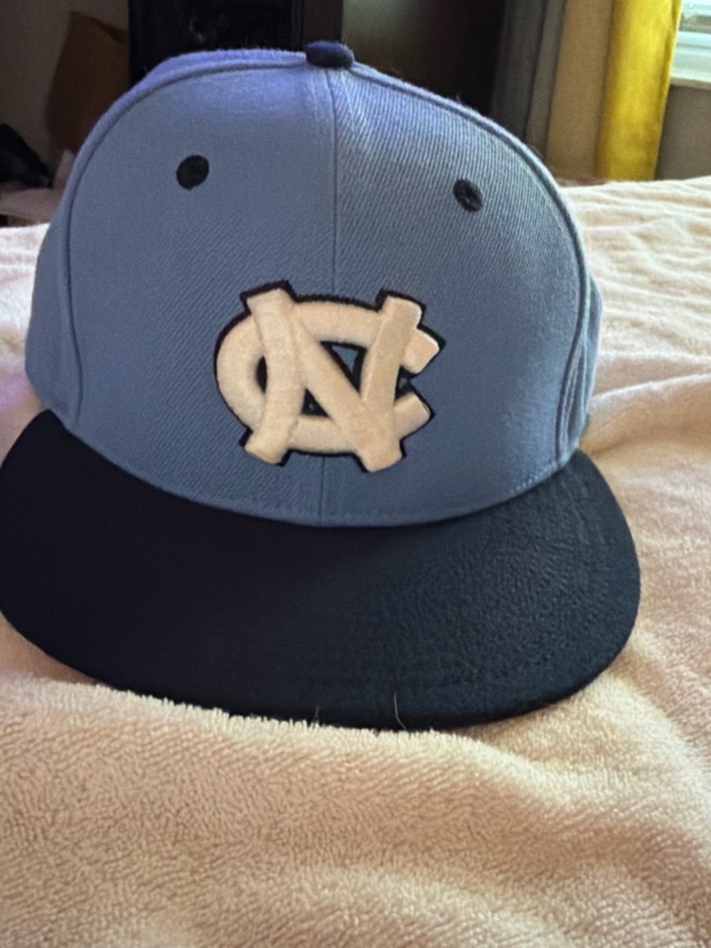 Nike Men's Carolina Blue and Navy Snapback fitted Hat with White Logo